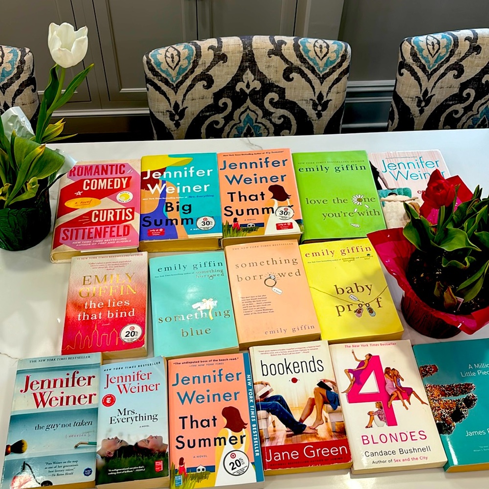 Assortment of hardcover and paperback books.